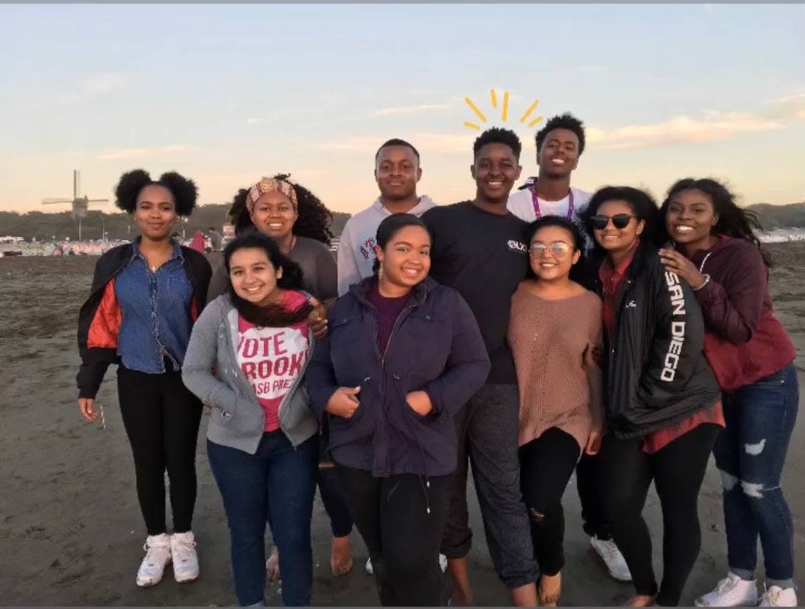 Bubacarr Kora poses for a picture with friends. He died during a high-speed vehicle pursuit on Highway 101 in San Luis Obispo County on July 4, 2022.