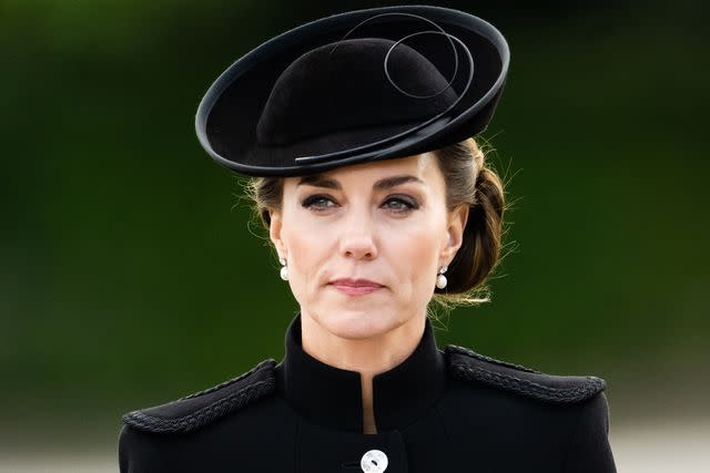 <p>Samir Hussein/WireImage</p> Kate Middleton meets military personnel taking part in Queen Elizbeth's funeral on Sept. 16, 2022