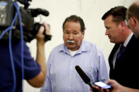 Fred Garcia, father of Anthony Garcia, speaks to reporters outside the Douglas County Court in Omaha, Neb., Friday, Sept. 14, 2018. Former doctor Anthony Garcia, convicted in the revenge killings of four people connected to a Nebraska medical school, was sentenced by a three-judge panel to death. Garcia was convicted in two attacks that occurred five years apart. The first victims were the son and housekeeper of a faculty member at Creighton University School of Medicine in Omaha. Garcia also was found guilty in the 2013 deaths of another Creighton pathology doctor and his wife. (AP Photo/Nati Harnik)