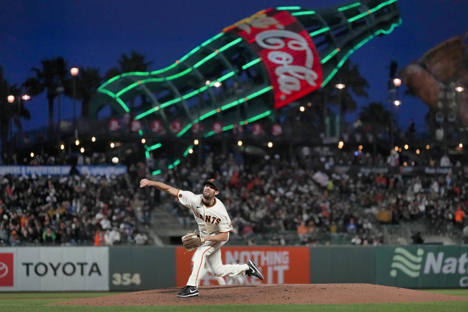 San Francisco Giants pitcher Tristan Beck throws against the New York Mets during the fifth inning of a baseball game in San Francisco, Thursday, April 20, 2023. Tiffany Fuentes and her family hosted San Jose Giants players from 2012 to 2019, including Tristan Beck. “We have a sign in our house that says ‘Enter as strangers, leave as friends,’ but really, it should say family," Fuentes said. (AP Photo/Tony Avelar)