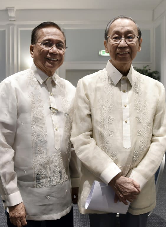 Chief of the National Democratic Front of Philippines (NDFP) Jose Maria Sison (R) poses for a photo next to Philippines Presidential Adviser on the Peace Process Jesus G. Dureza, in Rome, in January 2017