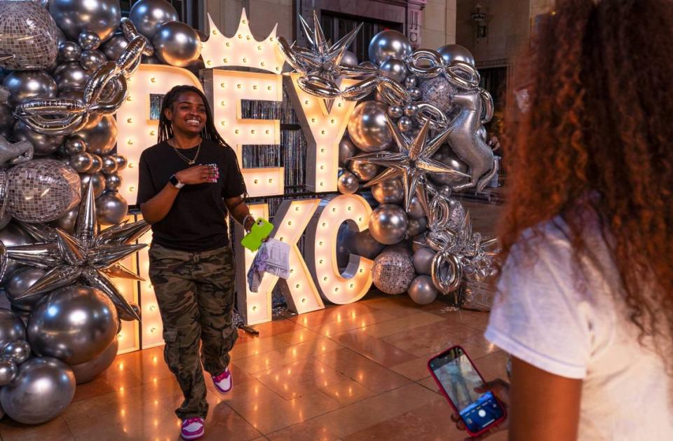 Toni Gooden, left, laughs after her friend Deashia Johnson took a photo of her in front of the Beyoncé sign Friday at Union Station.