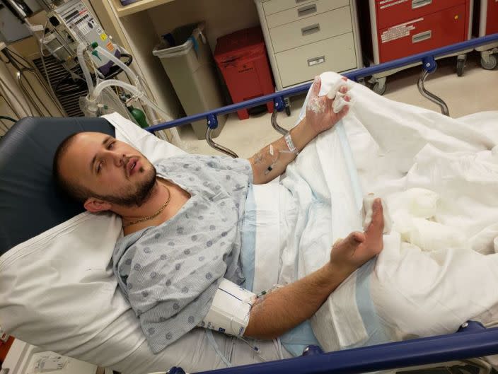 Mr Piluyev is pictured in hospital. Source: USA Today