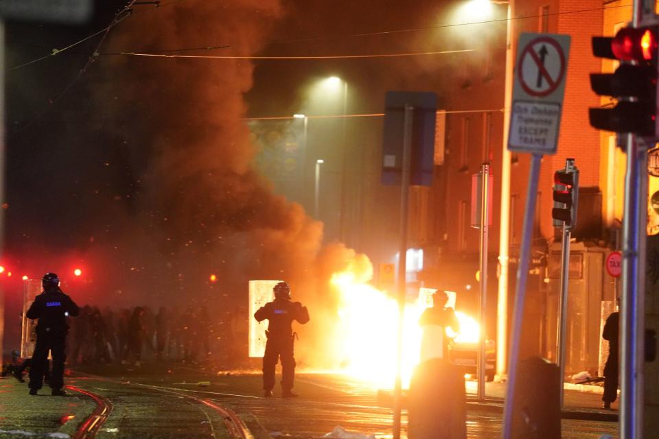 Police are tackling protests in Dublin city centre (PA)