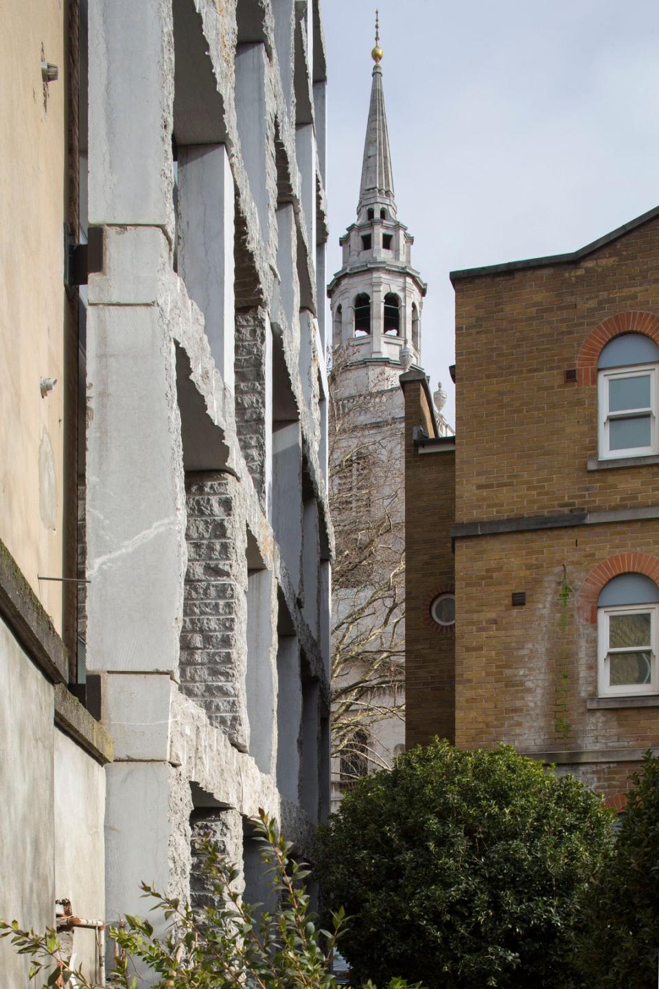 The load-bearing stone facade of 15 Clerkenwell Close in London.