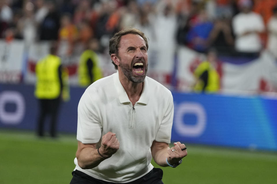 England's manager Gareth Southgate celebrates at the end of a semifinal against Netherlands at the Euro 2024 soccer tournament in Dortmund, Germany, Wednesday, July 10, 2024. England won the game 2-1. (AP Photo/Thanassis Stavrakis)