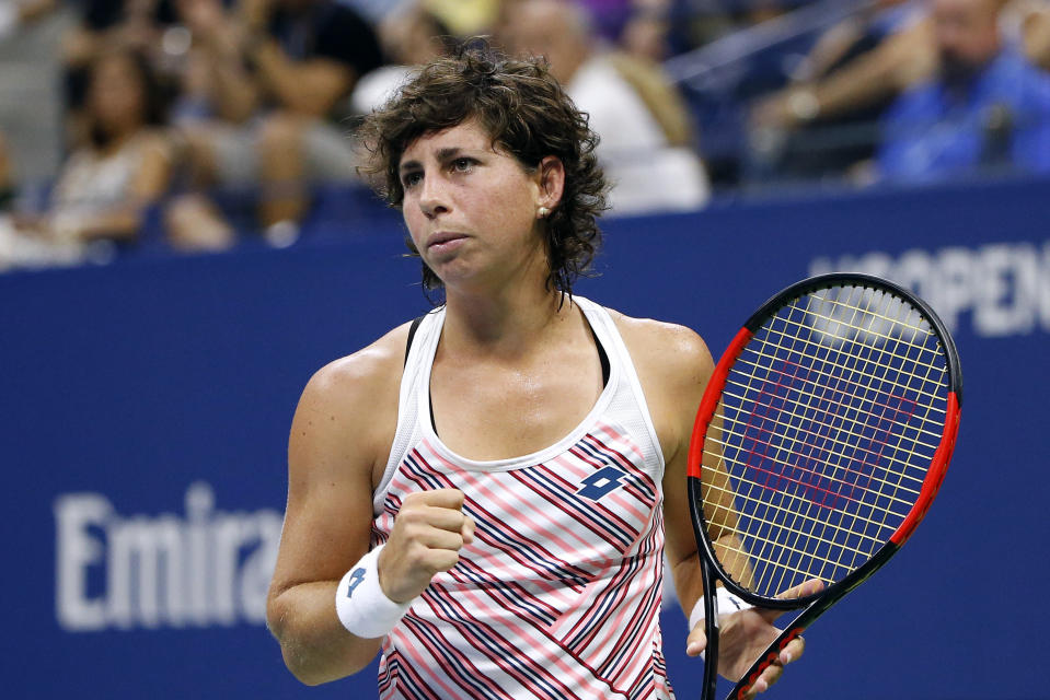 Carla Suarez Navarro, of Spain, reacts after winning a point against Maria Sharapova, of Russia, during the fourth round of the U.S. Open tennis tournament, Monday, Sept. 3, 2018, in New York. (AP Photo/Jason DeCrow)