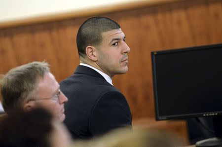 Former New England Patriots football player Aaron Hernandez appears in the court room of the Bristol County Superior Court House in Fall River, Massachusetts, in front of the jury before they begin their deliberations, April 8, 2015. REUTERS/Faith Ninivaggi