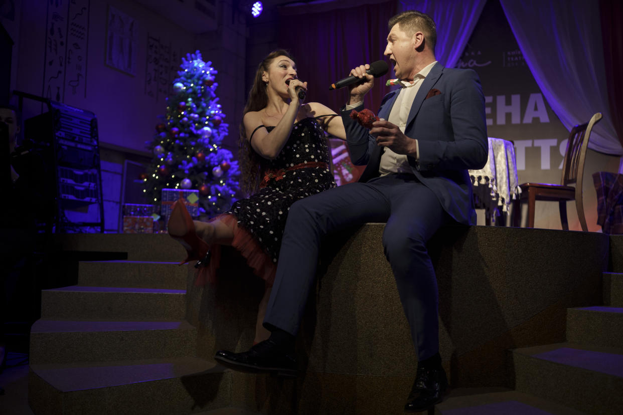 Members of the Kyiv Opera Theater perform the "Christmas in Shelter" concert, on a stage underground in Kyiv, Ukraine, Saturday, Dec. 24, 2022. (AP Photo/Renata Brito)