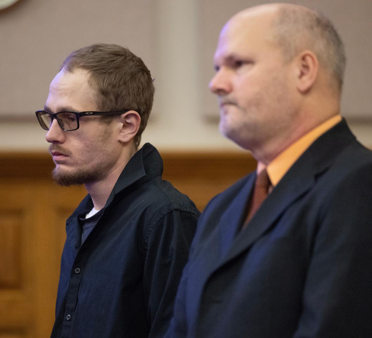 Tyler Scullion, left, accompanied by attorney Kevin McCue, was sentenced Monday to a year in prison for a Jan. 14 traffic crash that killed passenger Kyle O. Gill.