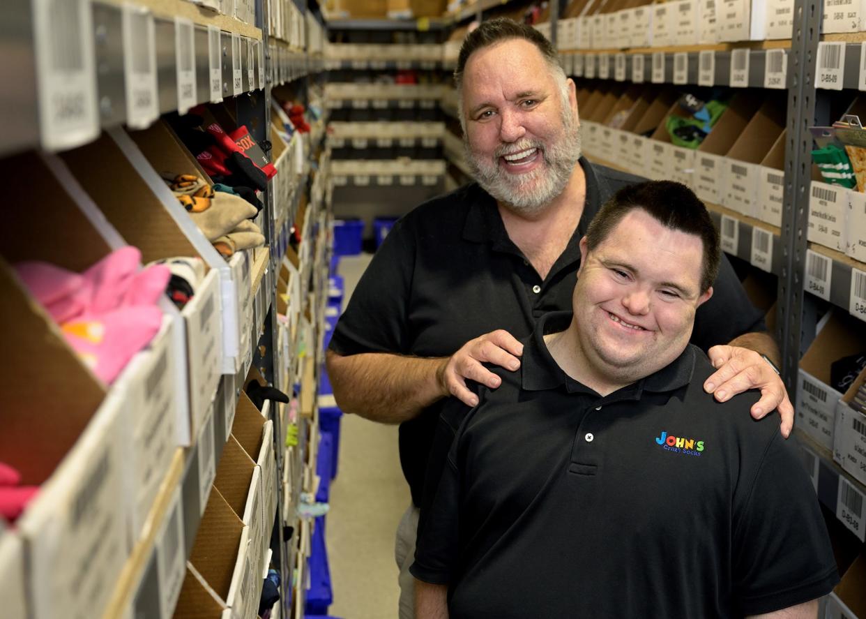 John's Crazy Socks co-founders Mark, rear, and John Cronin will be the keynote speakers at Logan Community Resources' Great Logan Nose-On Luncheon on March 26, 2024, at Century Center in South Bend.