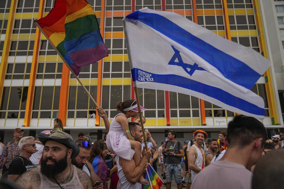 People participate in the annual Pride Parade in Tel Aviv, Israel, Thursday, June 8, 2023. (AP Photo/Ohad Zwigenberg)