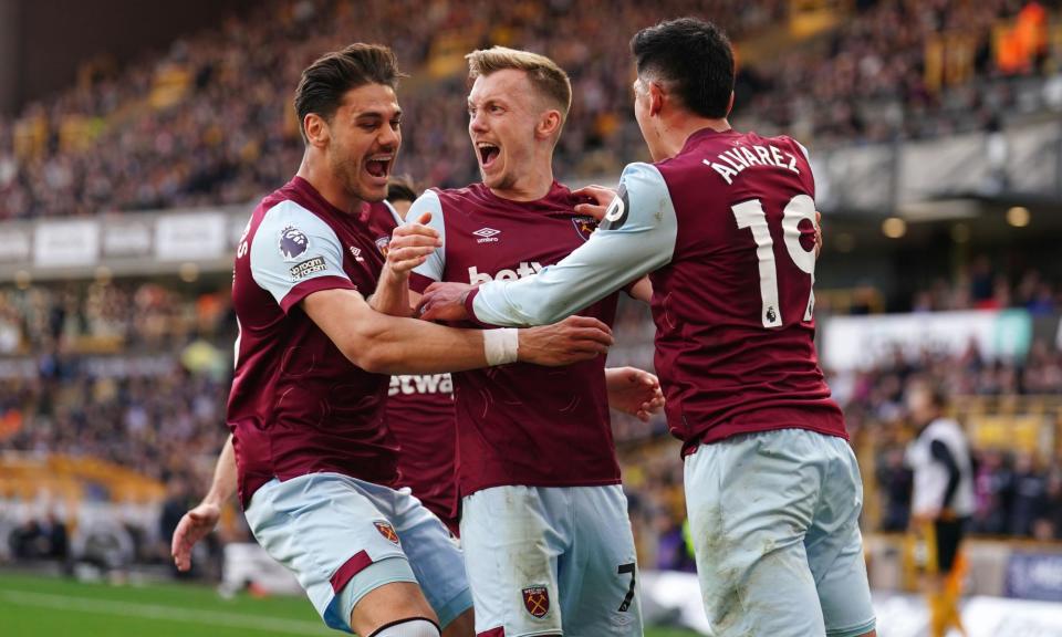 <span>James Ward-Prowse is mobbed by his teammates after scoring the winning goal for West Ham. </span><span>Photograph: Mike Egerton/PA</span>