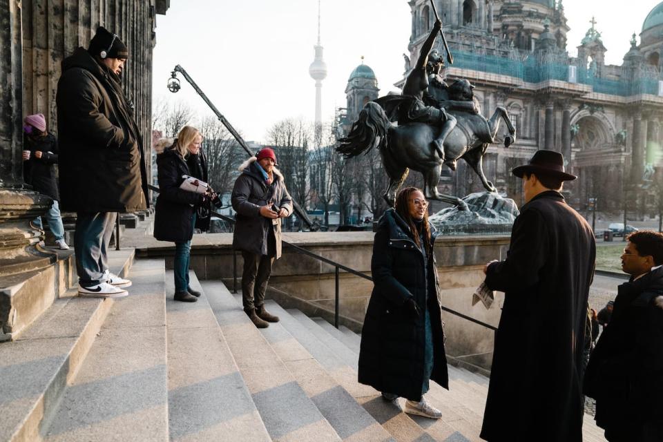 Ava DuVernay directs a scene set outside a library in Berlin, Germany as the Nazi party rises to power. 