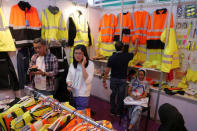 Workwear products are displayed at the China Import and Export Fair in Guangzhou, China April 17, 2017. REUTERS/Venus Wu