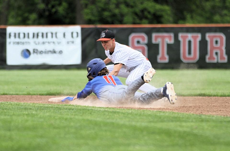 Sturgis shortstop Carter Oswald puts the tag on an Edwardsburg runner for an out at second base on Tuesday.