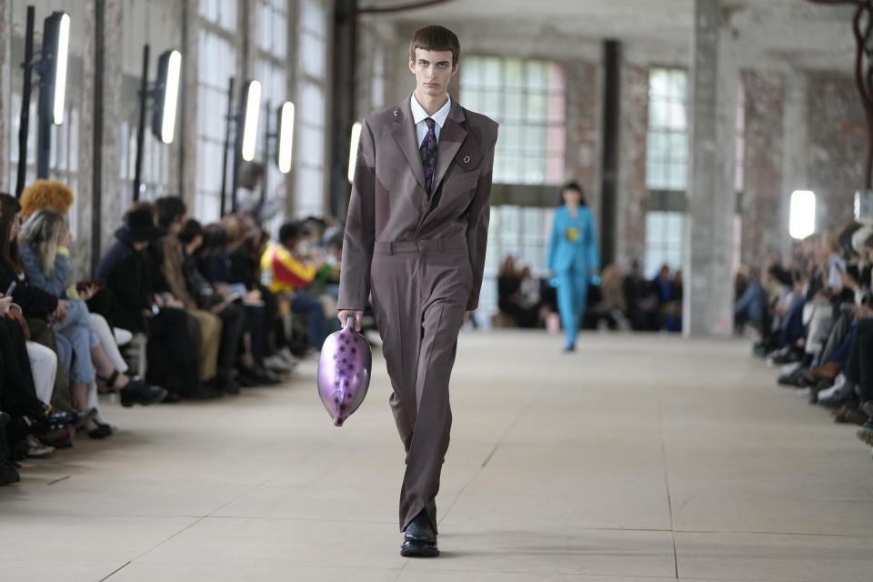 A model wears a creation for Botter for the ready-to-wear Spring/Summer 2023 fashion collection presented Tuesday, Sept. 27, 2022 in Paris. (AP Photo/Francois Mori)