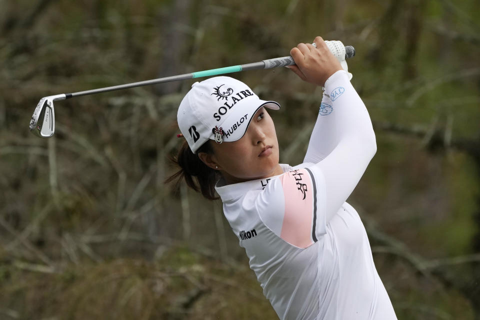 Jin Young Ko, of Korea, watches her tee shot on the eighth tee during the final round of the LPGA Tour Championship golf tournament, Sunday, Nov. 21, 2021, in Naples, Fla. (AP Photo/Rebecca Blackwell)