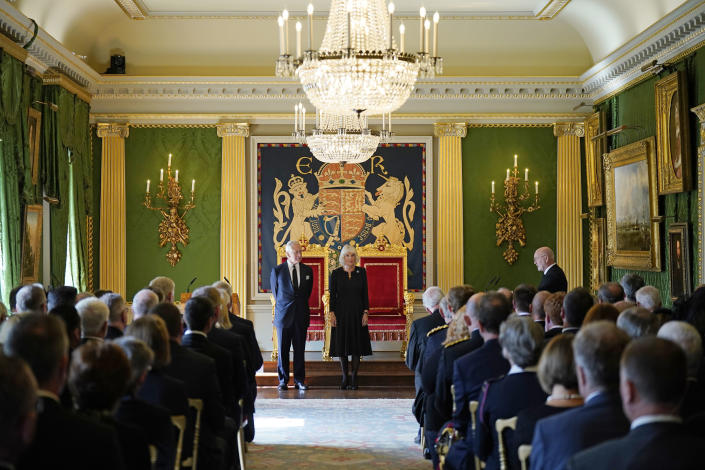 Britain's King Charles III and Camilla, the Queen Consort receive a Message of Condolence by the Speaker of the Northern Ireland Assembly at Hillsborough Castle, Belfast, Sept. 13, 2022, following the death Queen Elizabeth II. As King Charles III arrived in Northern Ireland for the first visit since his mother’s death elevated him to the throne, the voices of Belfast offered a sharp reminder of the country’s complicated bloody political realities. (Niall Carson/Pool Photo via AP)