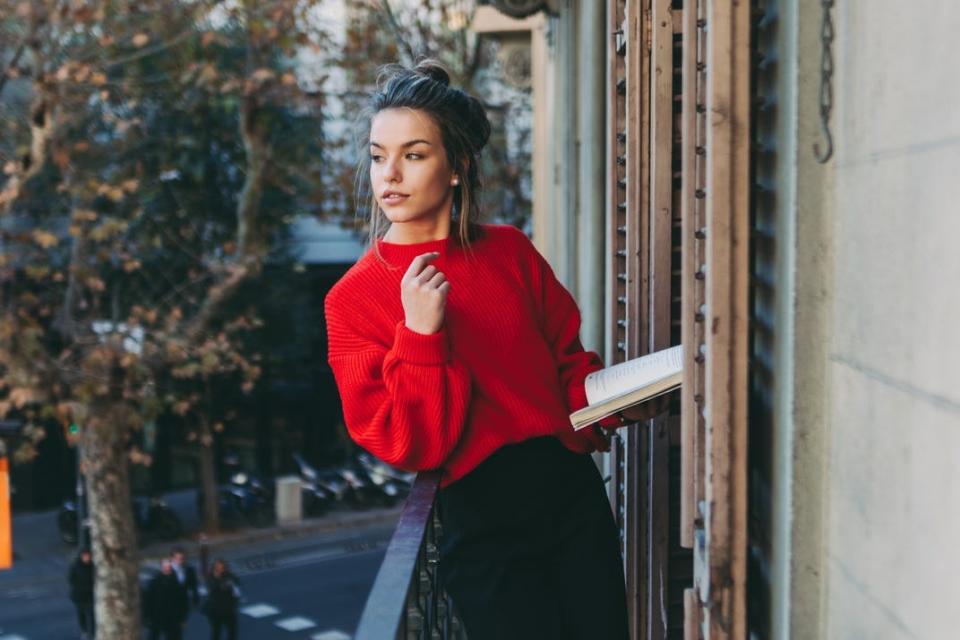 woman in red sweater