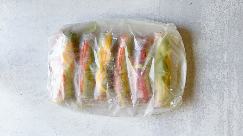 summer rolls covered with plastic wrap