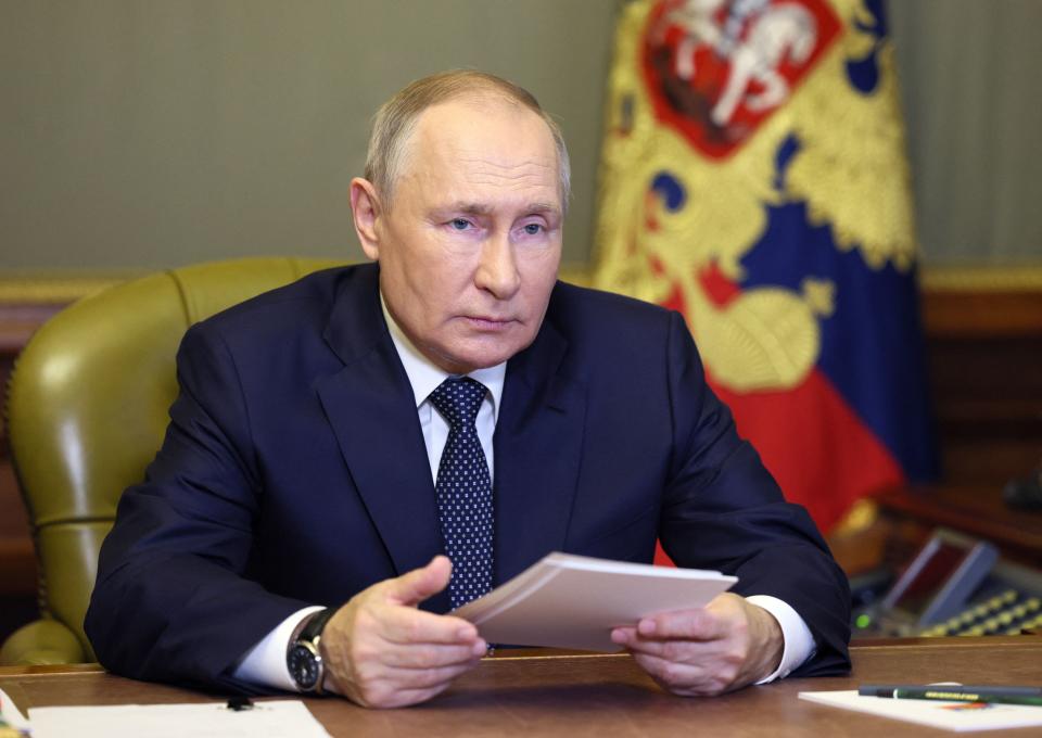 Russian President Vladimir Putin holds a video conference.