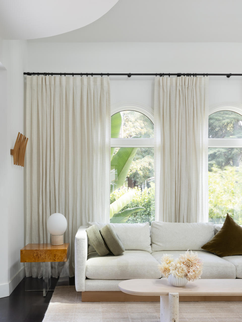 White couch in white living room