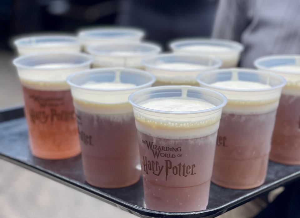 tray of butterbeer in the wizarding world of harry potter at universal
