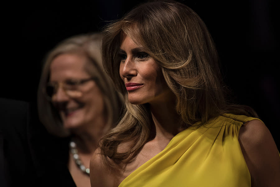 Melania Trump wore a yellow silk dress by Christian Dior to an event on the USS Intrepid in New York on May 4. (Photo: Getty Images)