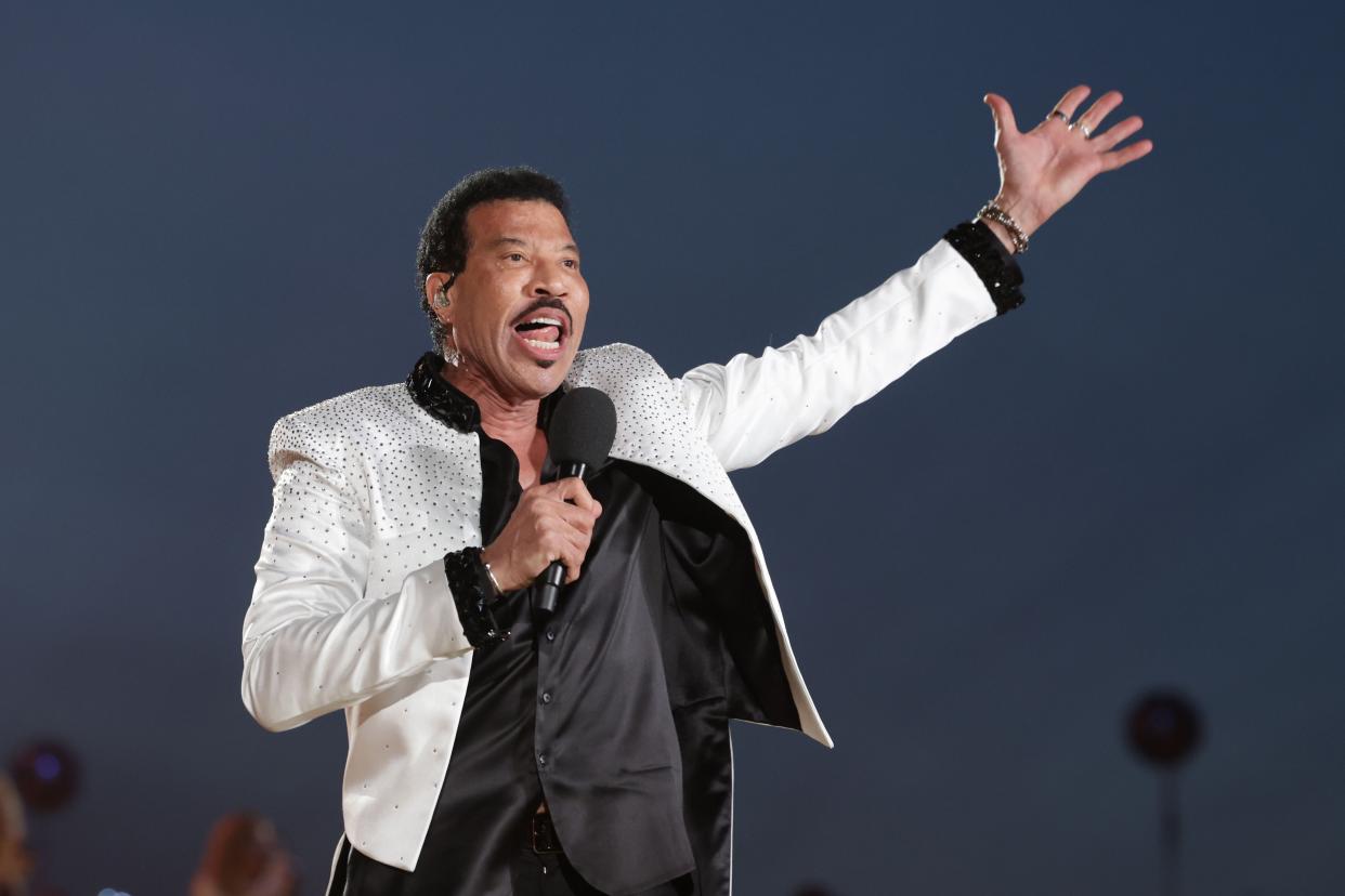 WINDSOR, ENGLAND - MAY 07: Lionel Richie performs on stage during the Coronation Concert on May 07, 2023 in Windsor, England. The Windsor Castle Concert is part of the celebrations of the Coronation of Charles III and his wife, Camilla, as King and Queen of the United Kingdom of Great Britain and Northern Ireland, and the other Commonwealth realms that took place at Westminster Abbey yesterday. Performers include Take That, Lionel Richie, Katy Perry, Paloma Faith, Olly Murs, Andrea Bocelli and Sir Bryn Terfel, Alexis Ffrench, Lang Lang & Nicole Scherzinger, Bette Midler, Tiwa Savage, Steve Winwood, Pete Tong and The Coronation Choir. (Photo by Chris Jackson/Getty Images)