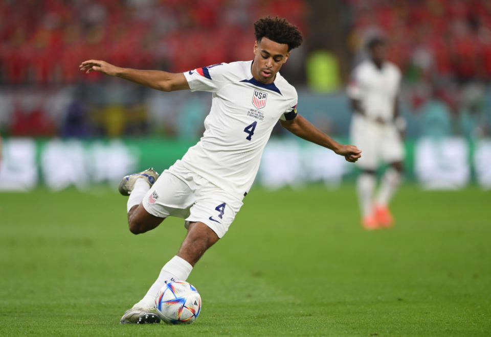 USA captain Tyler Adams in action during the match between USA and Wales at Ahmad Bin Ali Stadium on November 21, 2022.<span class="copyright">(Stu Forster—Getty Images)</span>