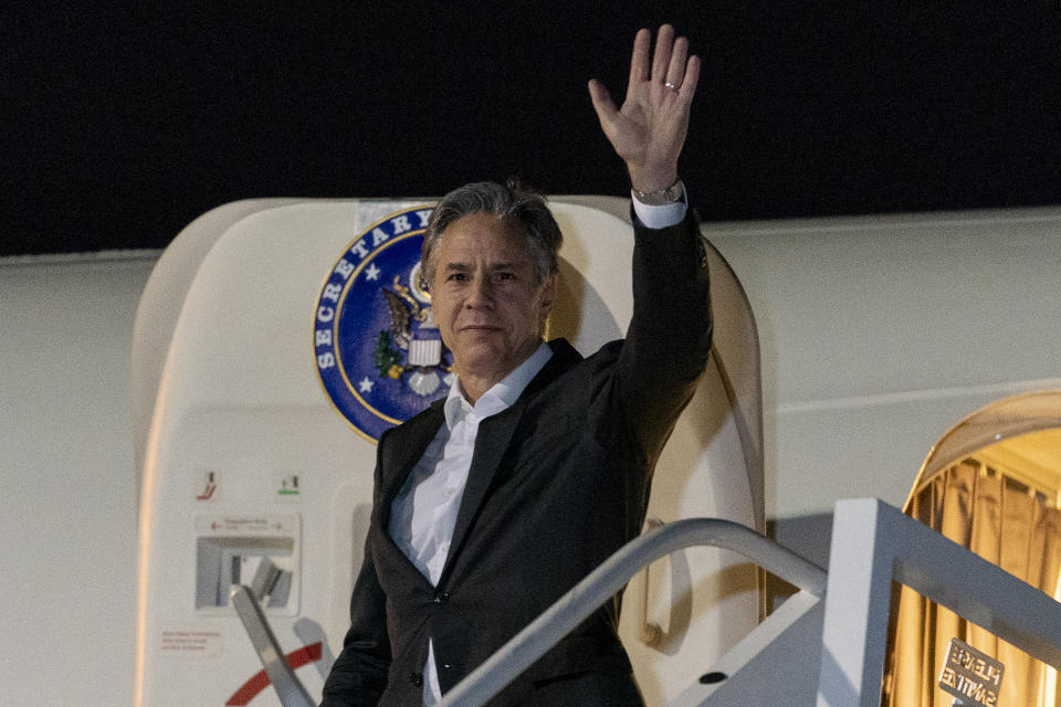 U.S. Secretary of State Antony Blinken waves as he arrives at Lanseria International Airport in Johannesburg, South Africa, Sunday, Aug. 7, 2022. Blinken is on a ten day trip to Cambodia, Philippines, South Africa, Congo, and Rwanda. (AP Photo/Andrew Harnik, Pool)