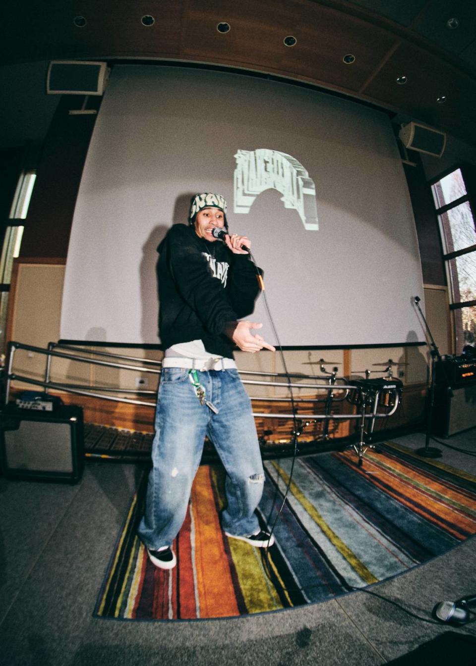 Critically-acclaimed Seattle rapper Oblé Reed performs in a Whitman College ballroom as headliner of the PNW Superheroes concert.