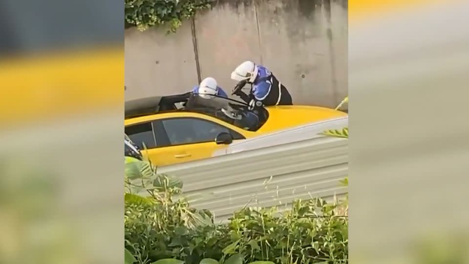 This screengrab from video posted on Twitter shows the moment when police interacted with a 17-year-old teen during a traffic stop in a Paris suburb. - From @Ohana_Fgn/Twitter