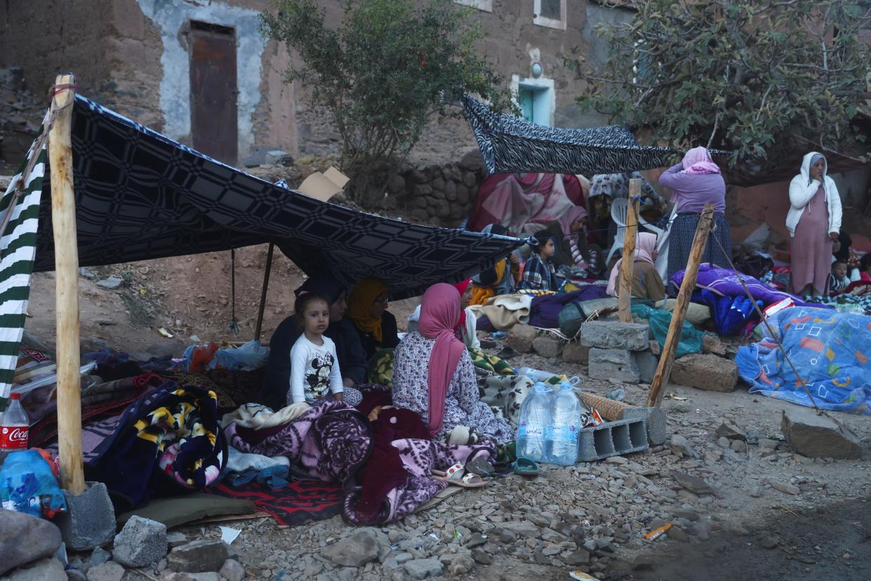 eople camp on the roadside in the aftermath of a deadly earthquake in Imgdal, Morocco (Reuters)