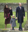 <p>In 2016, the Cambridges co-ordinated in shades of burgundy, navy and grey. Kate wore a burgundy Hobbs ‘Celeste coat,’ adding a faux fur collar. She accessorised with her Tod’s fringed pumps, her Mulberry ‘Bayswater’ clutch and pearl earrings. (PA) </p>