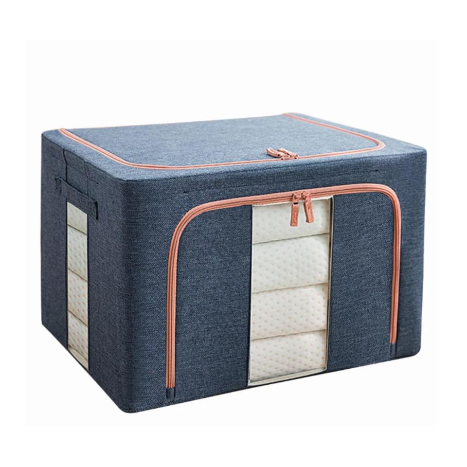 A navy blue clothes storage bag