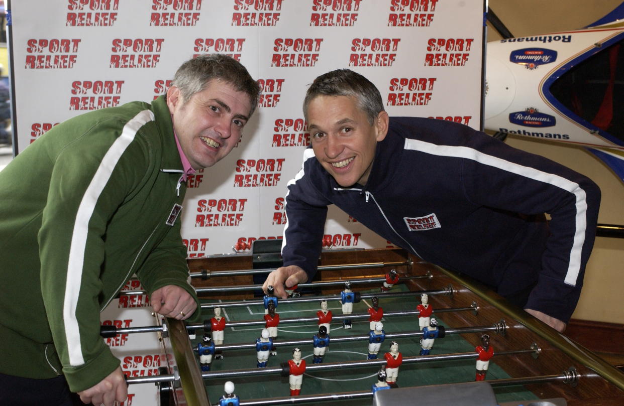 LONDON - MAR 5: Gary Lineker (right) and Nick Hancock (left) smiling in front of a sport relief banner for the launch of sport relief 2002 in London, England.  (Photo by Comic Relief/Getty Images)