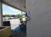 Bullet holes are viewed on a wall at Club Blu on July 25, 2016 in Fort Myers, Florida