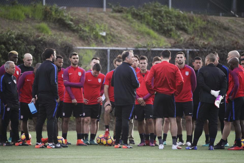 Coach Bruce Arena talks to the U.S. men's national soccer team members during a 2017 practice in Carson