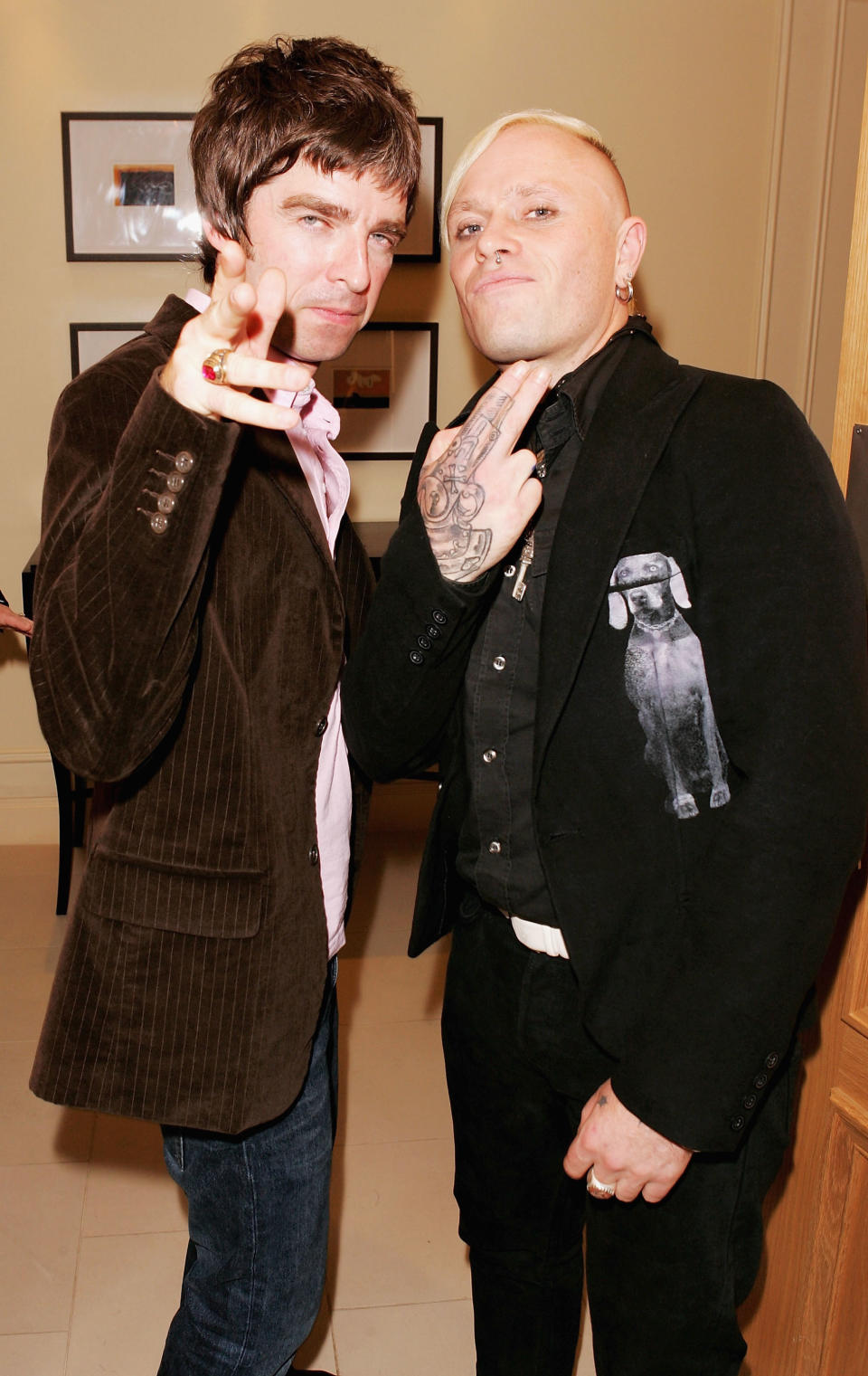 LONDON - OCTOBER 10: Oasis member Noel Gallagher (L) and Prodigy member Keith Flint attend The Q Awards, the annual magazine's music awards, at Grosvenor House on October 10, 2005 in London, England. (Photo by Dave Hogan/Getty Images)