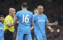 Football - Manchester United v Sunderland - Barclays Premier League - Old Trafford - 28/2/15 Referee Roger East mistakenly sends off Sunderland's Wes Brown as John O'Shea appeals Action Images via Reuters / Carl Recine