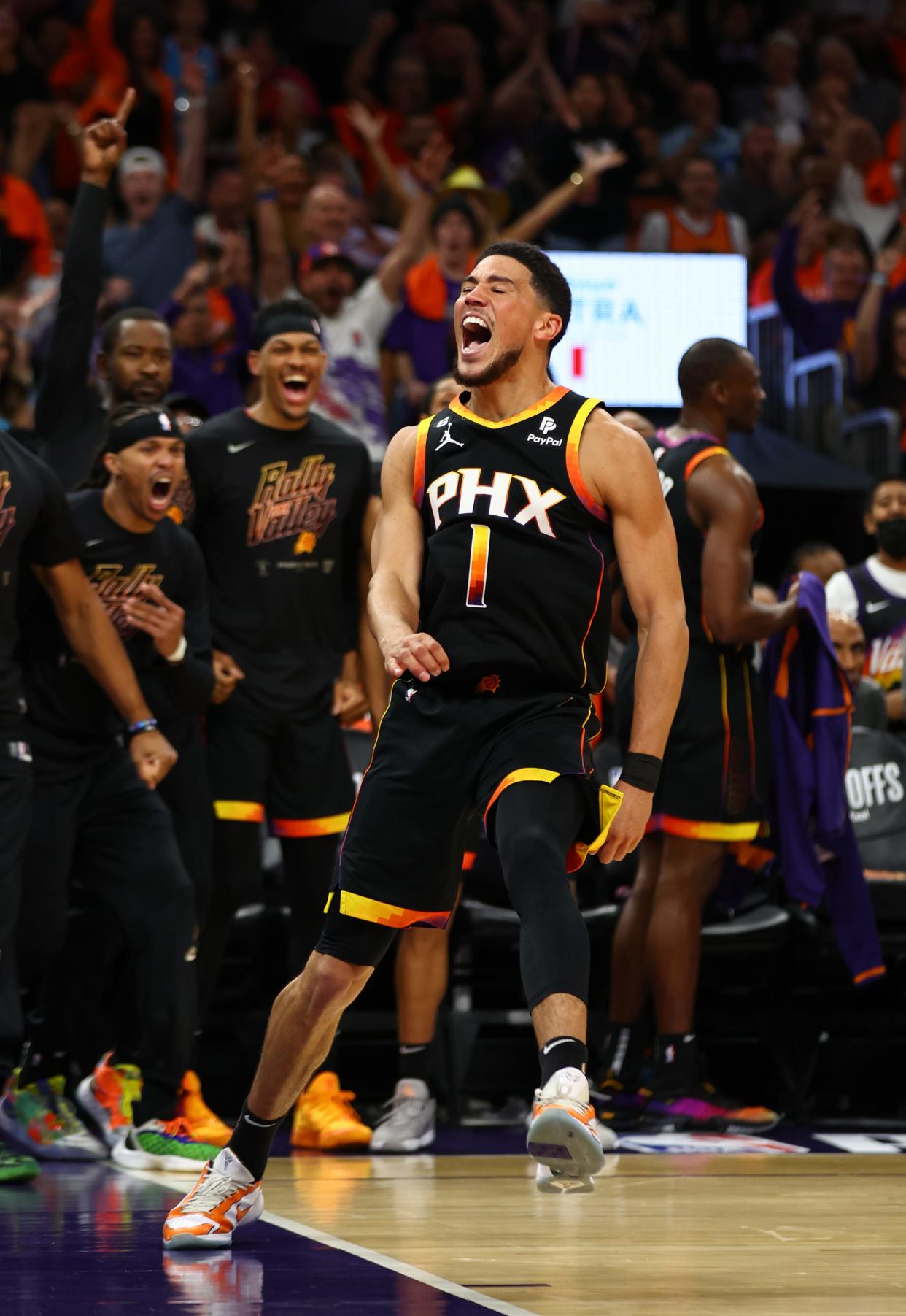 Phoenix Suns guard Devin Booker (1) celebrates after slam dunking the ball against the Los Angeles Clippers during the second half in game five of the 2023 NBA playoffs at Footprint Center in Phoenix on April 25, 2023. The Suns' ownership announced the team and its sister team in the WNBA, the Phoenix Mercury, would leave Bally Sports Arizona and broadcast most of their games over-the-air.