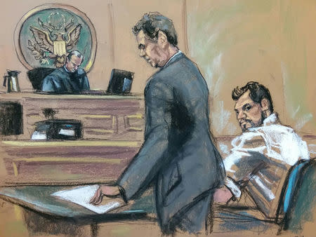 Mehmet Hakan Atilla (R), a deputy general manager of Halkbank, is shown in this court room sketch with his attorney Gerald J. DiChiara (C) as he appears before Judge James C. Francis IV in Manhattan federal court in New York, New York, U.S., March 28, 2017. REUTERS/Jane Rosenberg