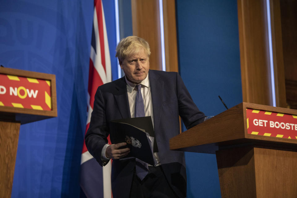 FILE - Britain's Prime Minister Boris Johnson looks on during a coronavirus media briefing in Downing Street, London, Jan. 4, 2022. Some Conservative lawmakers in Britain are talking about ousting Johnson, who has been tarnished by allegations that he and his staff held lockdown-breaching parties during the coronavirus pandemic. The party has a complex process for changing leaders that starts by lawmakers writing letters to demand a no-confidence vote. (Jack Hill, Pool Photo via AP, File)