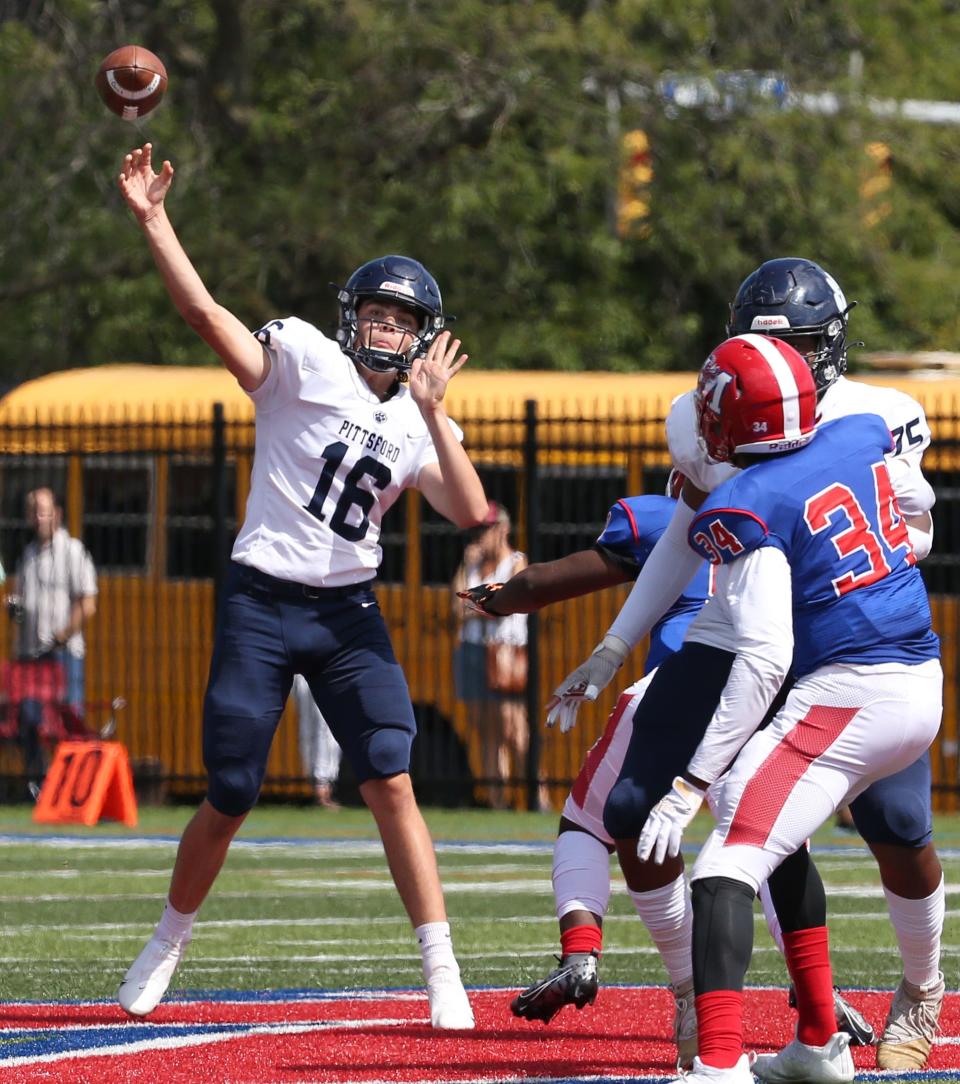 Pittsford quarterback Caleb Lewis sends a deep ball towards the end zone during their Section V season opening game Saturday, September 4, 2021 at James Monroe High School in Rochester. 