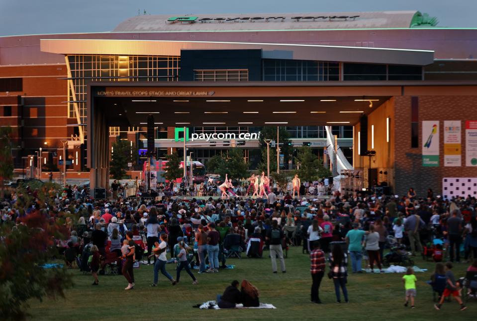 Audience members watch Oklahoma City Ballet's "Ballet Under the Stars" on Sept. 15, 2023 at Scissortail Park in Oklahoma City, Okla.