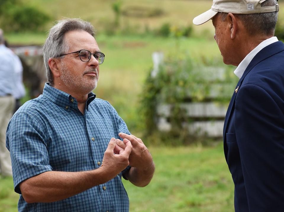 Fall River City Forester Mike Labossiere talks with state Rep. Paul Schmid, D-Westport, to mark the acquisition of the former Adirondack Farm in Fall River for the Southeastern Massachusetts Bioreserve.