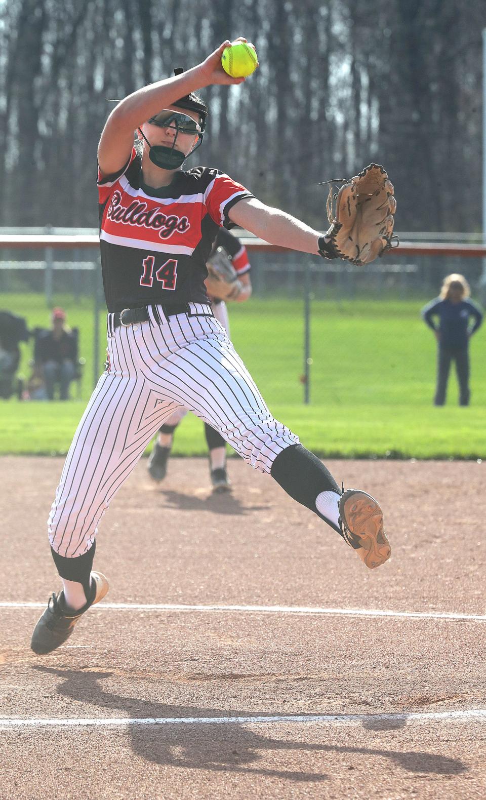 Green pitcher Avery Robinson throws a pitch against Walsh Jesuit on Tuesday, April 11, 2023 in Green.