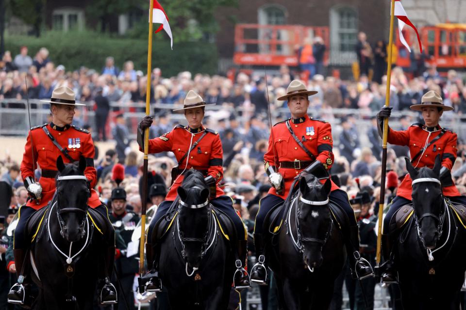 Royal Canadian Mounted Police led the procession during the state funeral of Queen Elizabeth II at Westminster Abbey on Sept. 19, 2022 in London, England. (Photo by Marko Djurica - WPA Pool/Getty Images)